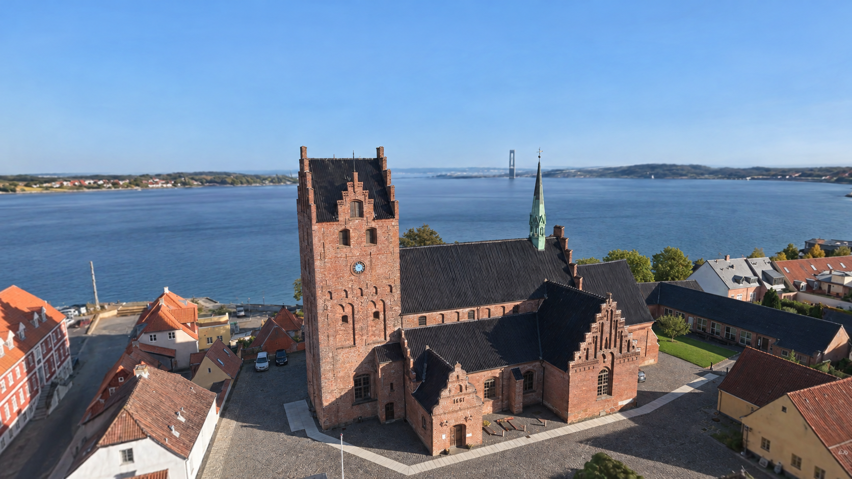 Gaussian Splatting-model af en kirke ved vandet